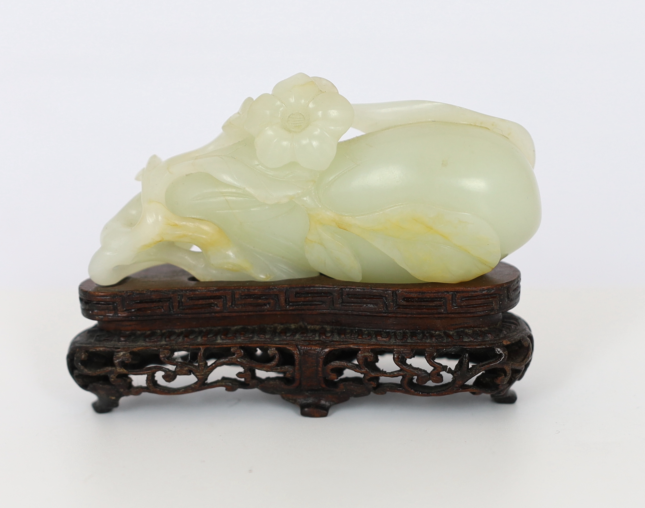 A Chinese pale celadon jade carving of a fruit, 18th century